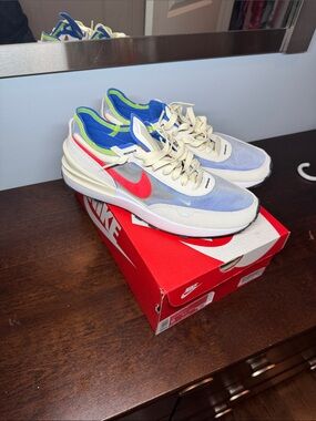 Nike Light Blue Sneakers with Red Swoosh and Neon Green Trim